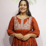 ORANGE MUL CHANDERI WITH AARI JARI WORK SUIT